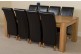 Kuba Solid Oak 220cm Dining Table with 8 Montana Dining Chairs [Black Leather]